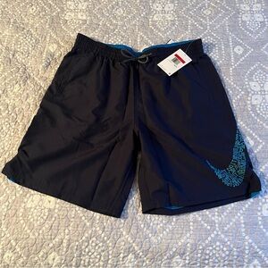 Nike Swim Black Swim Trunks with Blue Trim. Size large, 8 inch inseam.